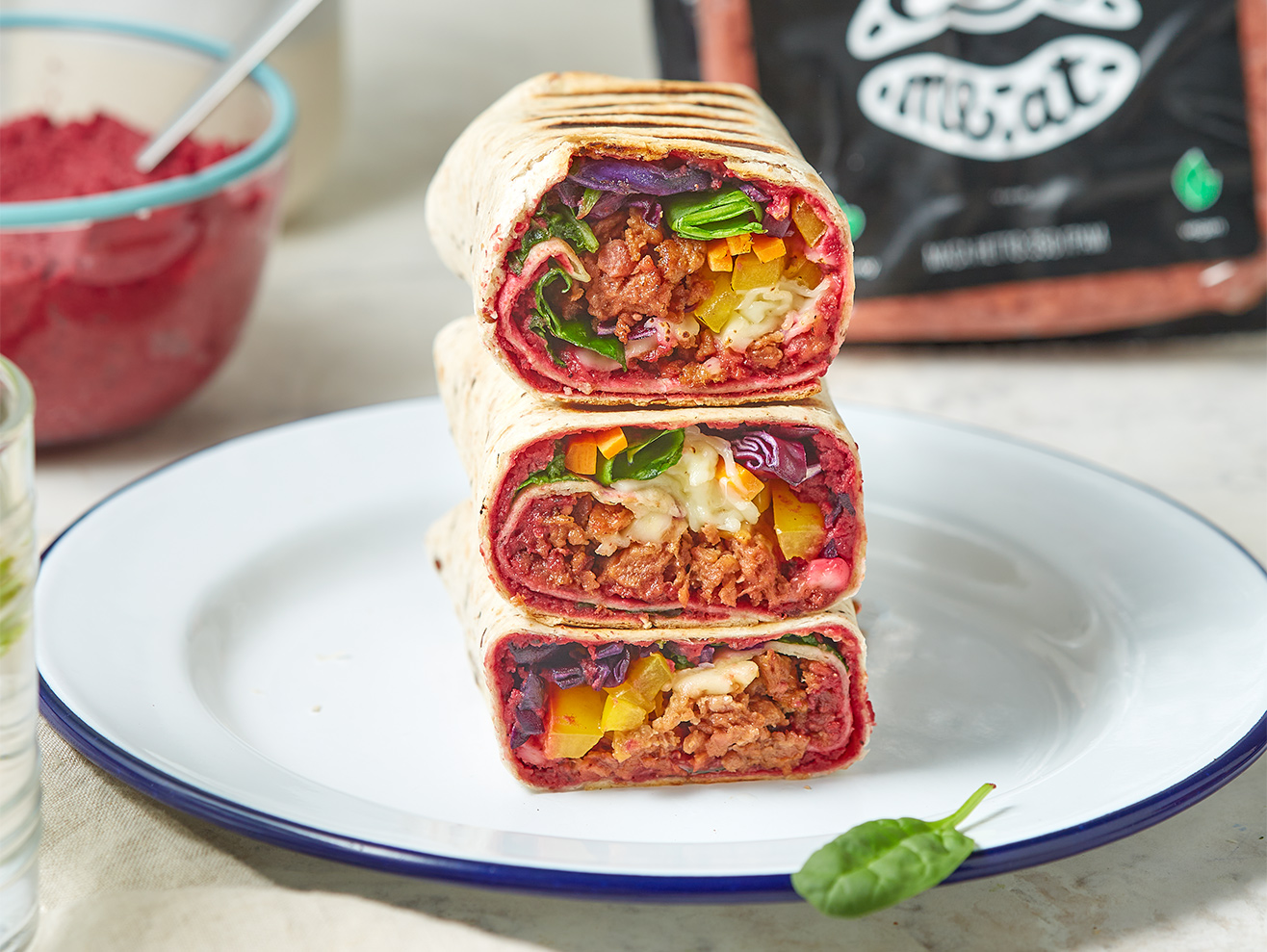 Wraps with Eat Me At minced meat, vegetables and beetroot hummus