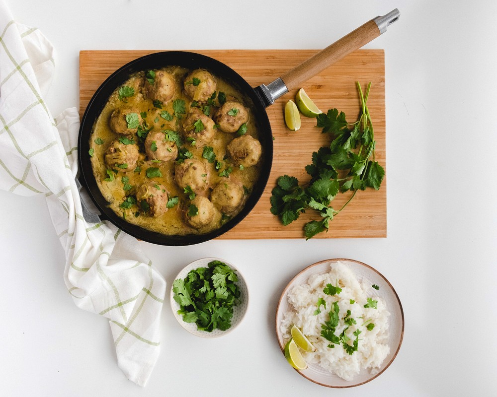 Meat bolls Eat Me At in curry sauce